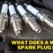 What Does A White Spark Plug Mean