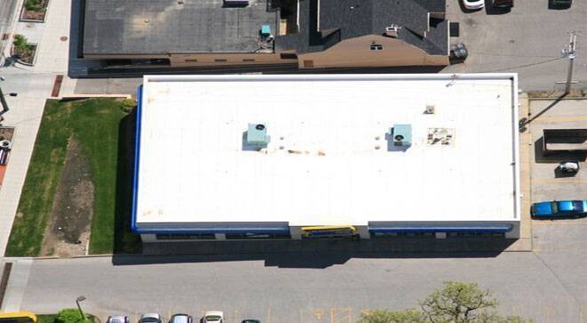 Why Do Large Commercial Buildings Use Flat Roof Designs?