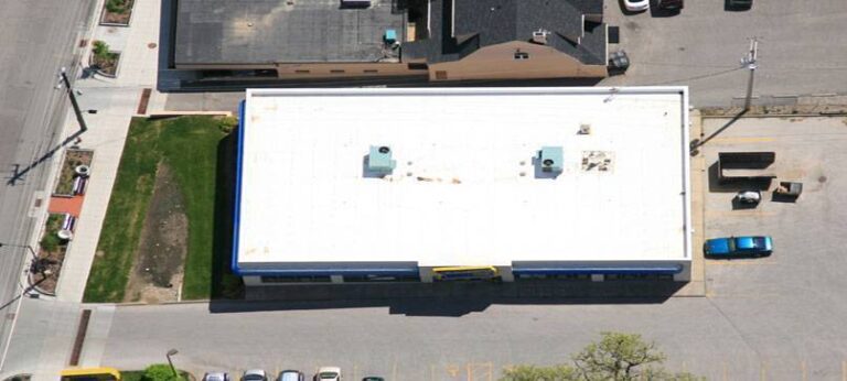 Why Do Large Commercial Buildings Use Flat Roof Designs?